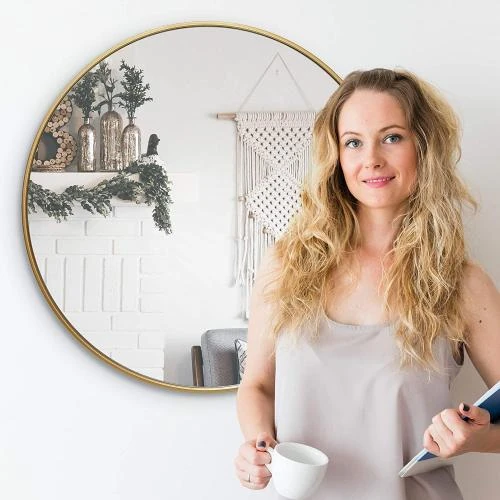 Détail de Miroir mural rond doré, cadre aluminium brossé, décoration élégante