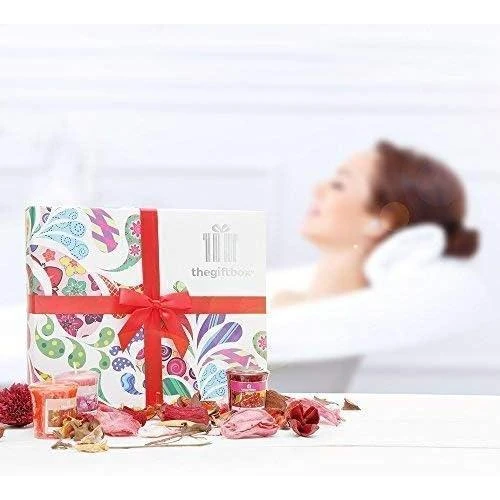Zoom sur Bougies parfumées, coffret cadeau luxe, idées cadeaux élégantes
