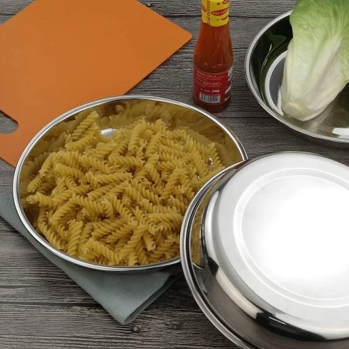 Zoom sur Fosly, 4 plats service ronds en acier inoxydable