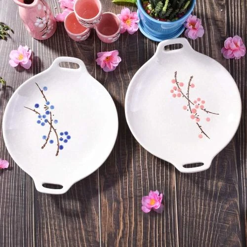 Détail de Assiettes japonaises céramique peintes à la main, rouges, bleues