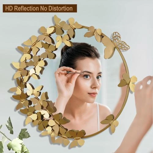 Détail de Miroirs muraux dorés métal papillon, décoration intérieure élégante