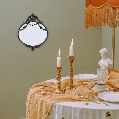 Zoom sur Miroir mural ovale métal noir, décoration intérieure élégante