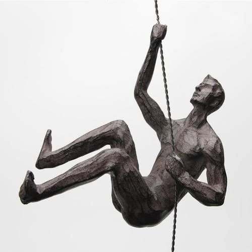 Détail de Sculpture murale homme rétro nordique résine, déco cuivre noir