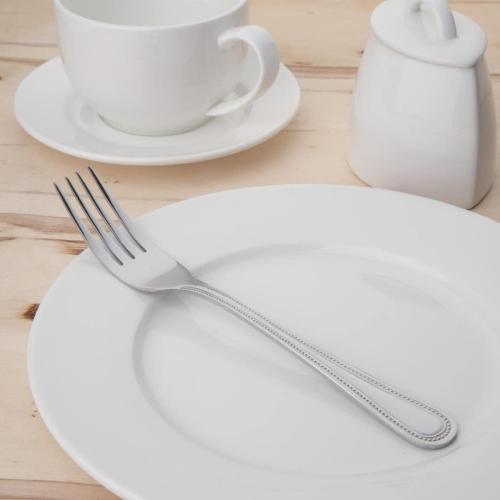 Présentation de Fourchettes de table Olympia, lot de 12, acier inoxydable en situation