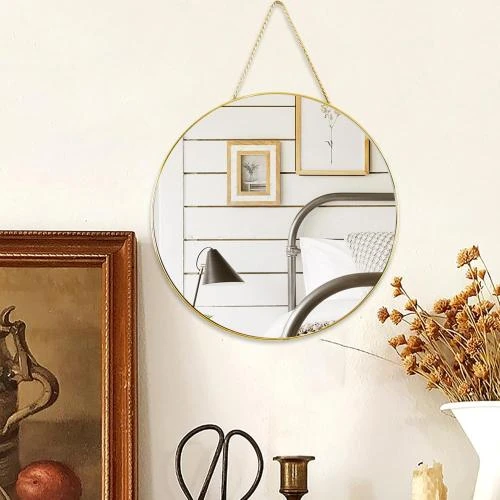 Zoom sur Miroir rond suspendu doré, miroir salle de bain