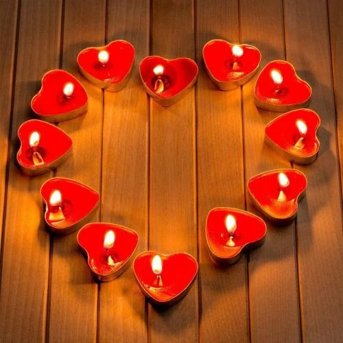 Zoom sur Bougies chauffe-plat mariage, dîner, fête, Saint Valentin, rouge
