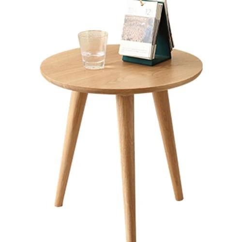 Zoom sur Table basse ronde chêne massif, meuble moderne, lampe chevet