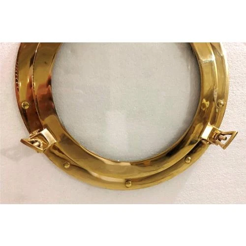 Zoom sur Hublot laiton, verre antique, cadre photo, décoration murale