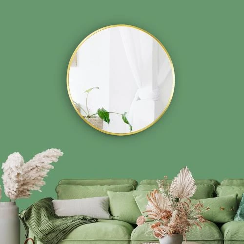 Détail de Miroir mural rond doré, décoration élégante moderne