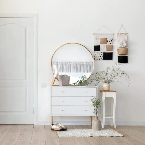 Zoom sur Miroir mural rond doré, décoration élégante moderne