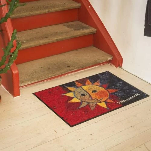 Zoom sur Tapis Soleil Salonloewe, décoration intérieure élégante
